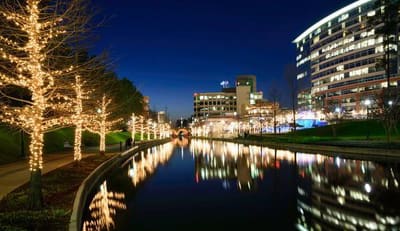 The Woodlands Waterway lit up at night